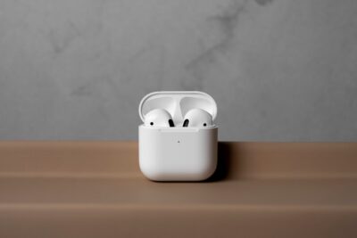 modern wireless earphones with case simple concrete background 23 2150808009