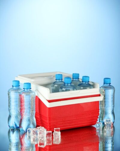 traveling refrigerator with bottles water ice cubes blue background 392895 126233